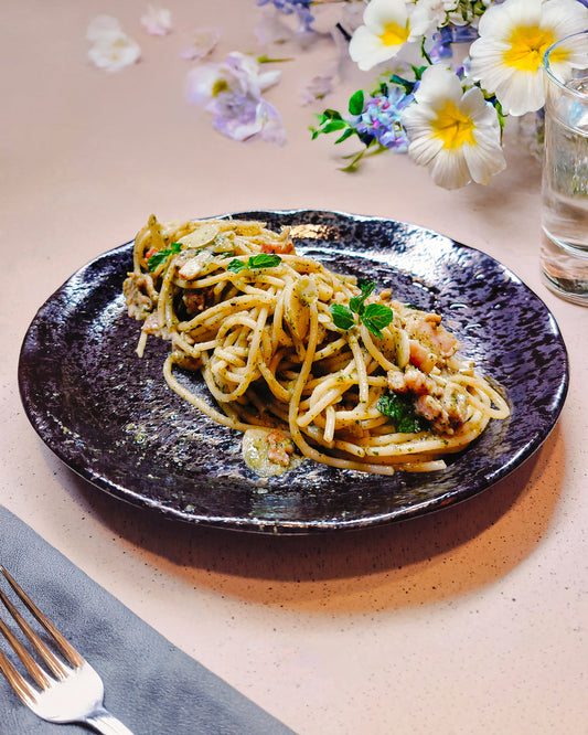 Spaghetti dish with minty pea pesto sauce for a healthy, quick dinner