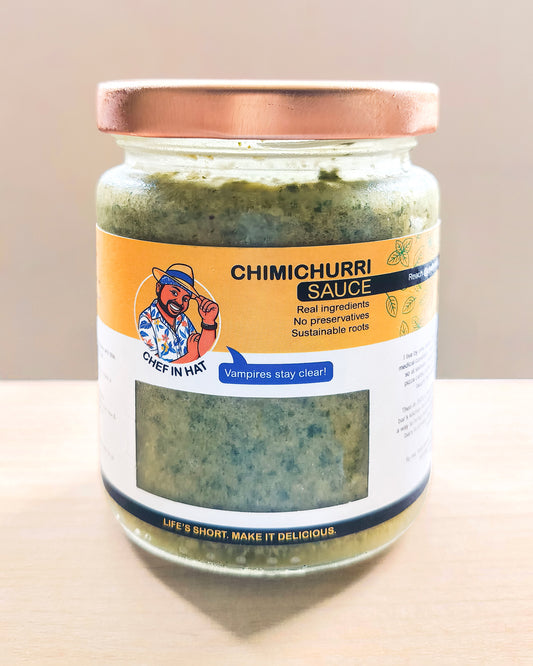 Jar of organic Chimichurri sauce made from fresh herbs, ideal for red meats like pork, beef, lamb etc.