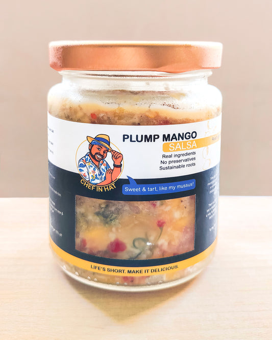 Jar of organic Mango Salsa, made fresh and perfect for seafood or red meats